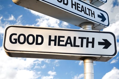 Good Health direction sign on sky background-2