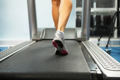 Image of female foot running on treadmill