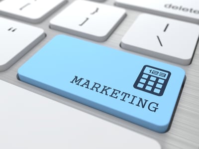 Marketing Concept. Marketing Word on Blue Computer Button.